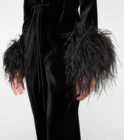 Shop Saint Laurent Feather-trimmed Velvet Jumpsuit In Black