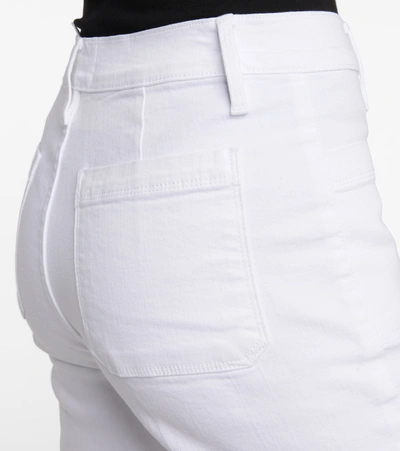 Shop Frame Le Bardot High-rise Flared Jeans In White