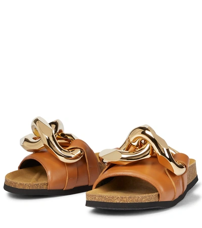 Shop Jw Anderson Embellished Leather Slides In Brown