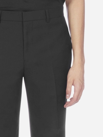 Shop Givenchy Virgin Wool Trousers In Black