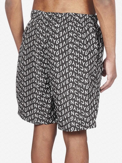 Shop Givenchy All-over Logo Print Swim Shorts In Black - White