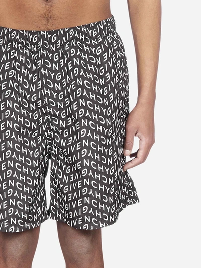 Shop Givenchy All-over Logo Print Swim Shorts In Black - White