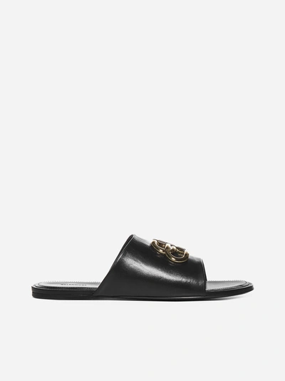 Shop Balenciaga Bb Logo Leather Slides In Black - Gold