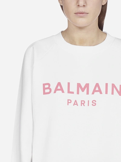 Shop Balmain Logo Cotton Sweatshirt In White - Pink