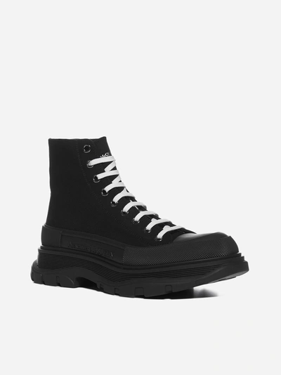 Shop Alexander Mcqueen Tread Slick Canvas Ankle Boots In Black