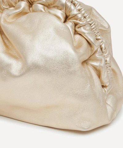 Shop Mansur Gavriel Leather Cloud Clutch In Gold-tone
