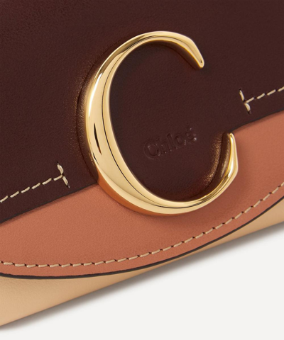 Shop Chloé Chloe C Small Leather Tri-fold Wallet In Dusky Brown