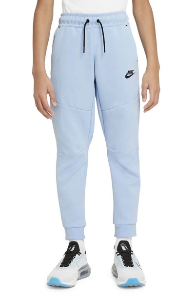 Shop Nike Tech Fleece Pants In Psychic Blue/ Black