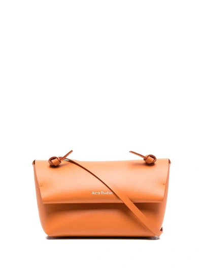 Shop Acne Studios Knotted-strap Purse In 橘色