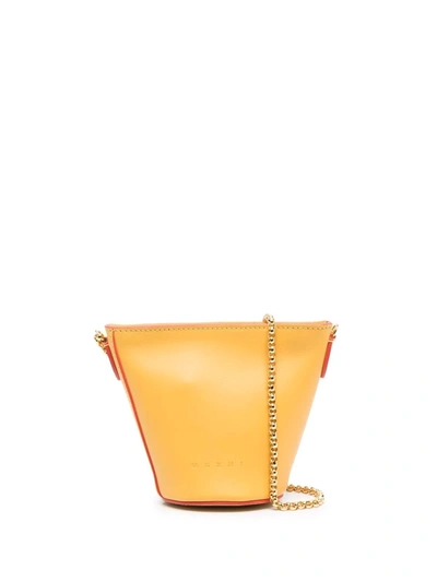 Shop Marni Debossed-logo Leather Bucket Bag In Gelb