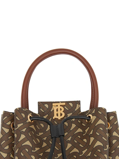 Shop Burberry Monogram Bucket Bag In Brown