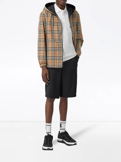 Shop Burberry Checked Nylon Jacket In Beige