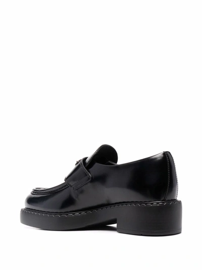 Shop Prada Leather Loafers In Black