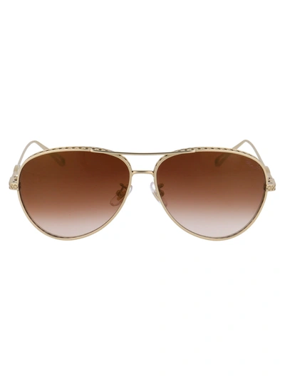 Shop Chopard Eyewear Aviator Frame Sunglasses In Gold