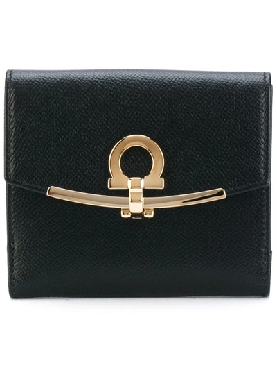 Ferragamo Hammered Leather Gold Gancini Compact Wallet In Black
