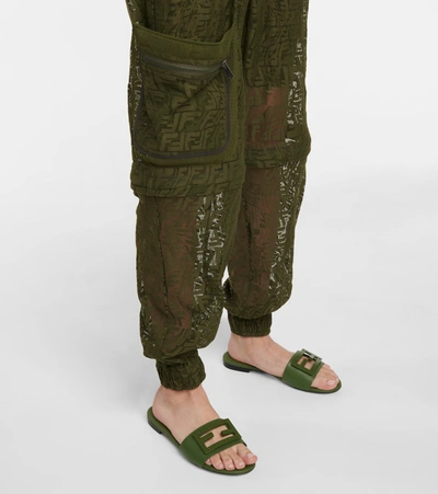 Shop Fendi Logo Lace And Mesh Cargo Jumpsuit In Green