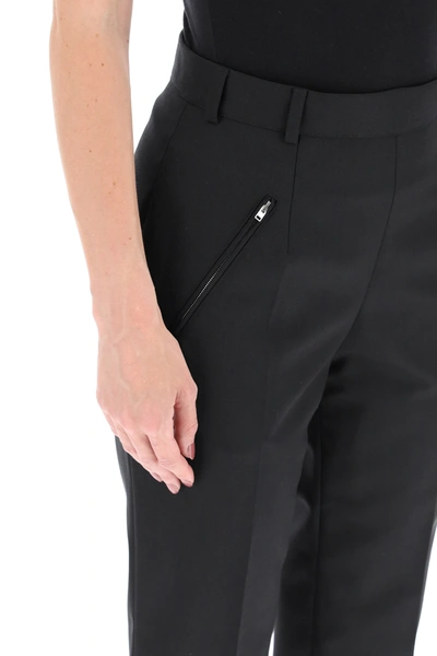 Shop Maison Margiela Icons Trousers In Black