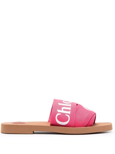 Shop Chloé Woody Slide Sandals In 粉色