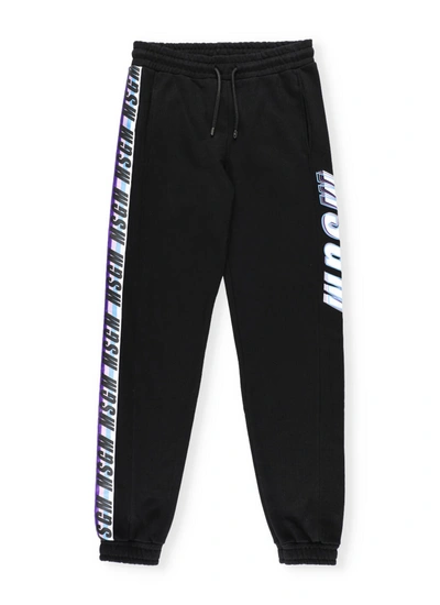 Shop Msgm Cotton Trackpants In Black