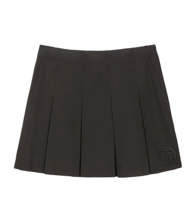 Shop Burberry Kids Cotton Monogram Pleated Skirt (6-24 Months) In Black