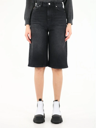 Shop Ganni High-waisted Stretch Denim Bermuda Shorts In Black