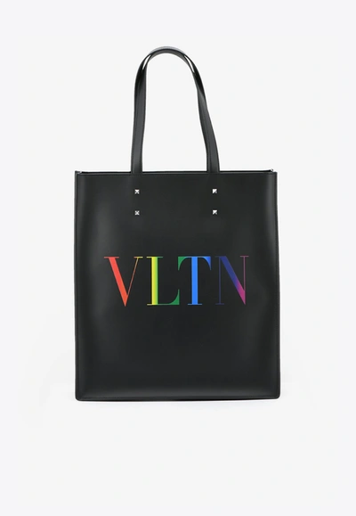 Shop Valentino Vltn Leather Tote Bag With Multicolored Logo Print In Black