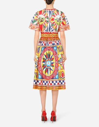 Shop Dolce & Gabbana Calf-length Dress In Carretto-print Silk In Multicolor