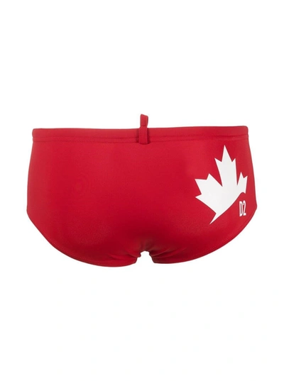Shop Dsquared2 Red Swimming Trunks With Rear Maple Leaf Print