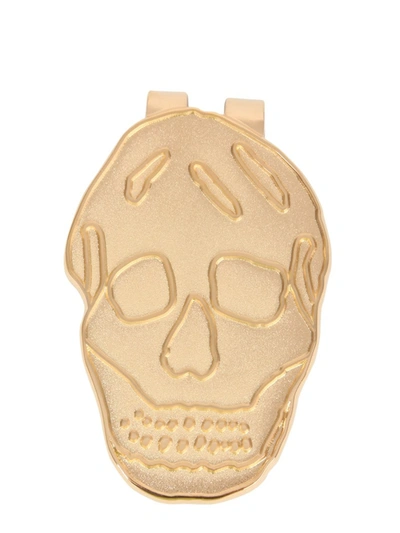 Shop Alexander Mcqueen Banknotes Skull Clip In Gold