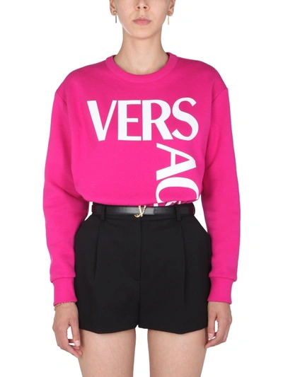 Shop Versace Crew Neck Sweatshirt In Fuchsia