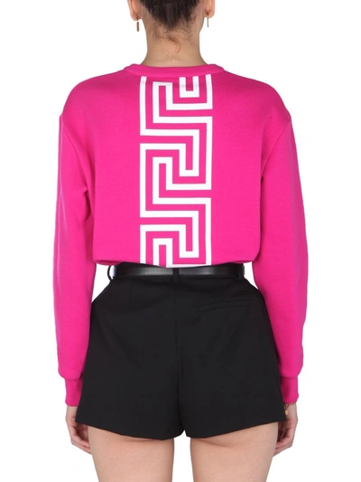 Shop Versace Crew Neck Sweatshirt In Fuchsia