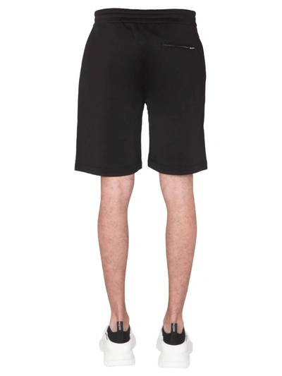 Shop Alexander Mcqueen Shorts With Embroidered Logo In Black