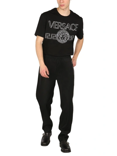 Shop Versace T-shirt With Embroidered Medusa Logo In Black