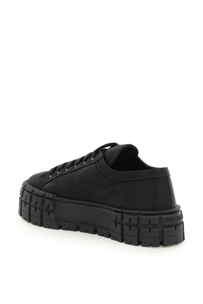 Shop Prada Wheel Sneakers In Black