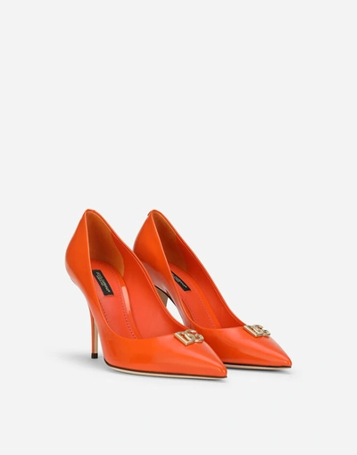 Shop Dolce & Gabbana Patent Leather Pumps With Dg Logo In Orange
