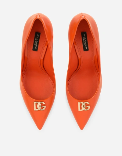 Shop Dolce & Gabbana Patent Leather Pumps With Dg Logo In Orange