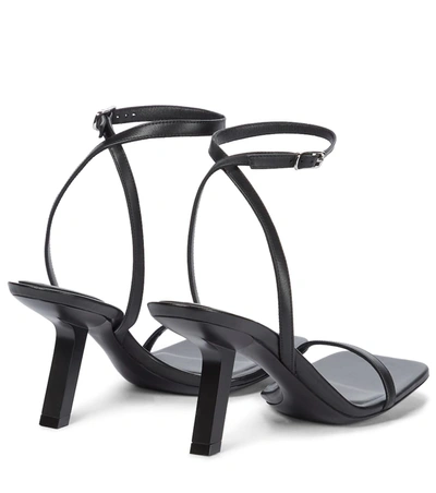 Shop Balenciaga Void Leather Sandals In 黑色
