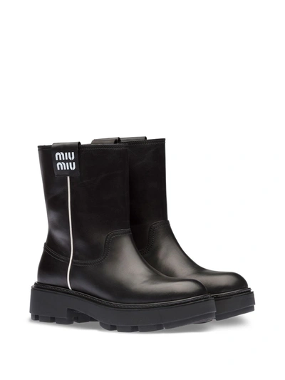 Miu Miu Classic Logo Patched Boots In Black | ModeSens