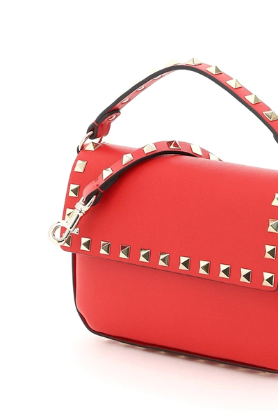 Shop Valentino Garavani Baguette Bag With Rockstuds In Red