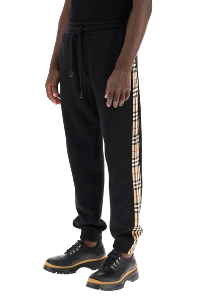 Shop Burberry Checkford Jogger Pants In Black