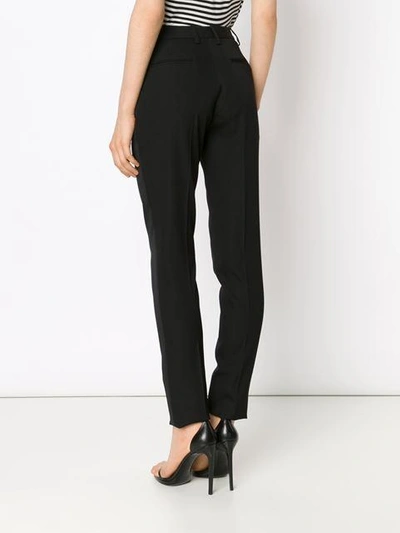 Shop Saint Laurent Tux Stripe Trousers In Black