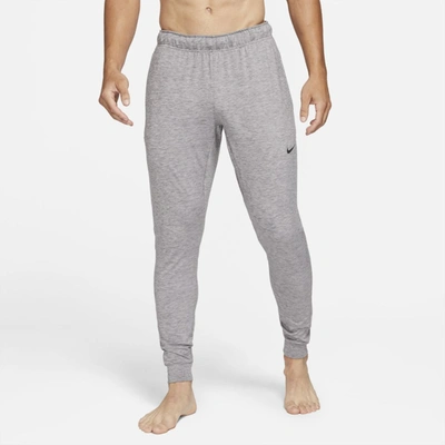 Shop Nike Yoga Dri-fit Men's Pants In Gunsmoke,heather,black
