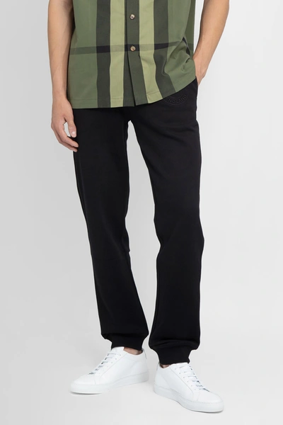 Shop Burberry Trousers In Black