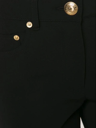 Shop Moschino Slim Fit Trousers