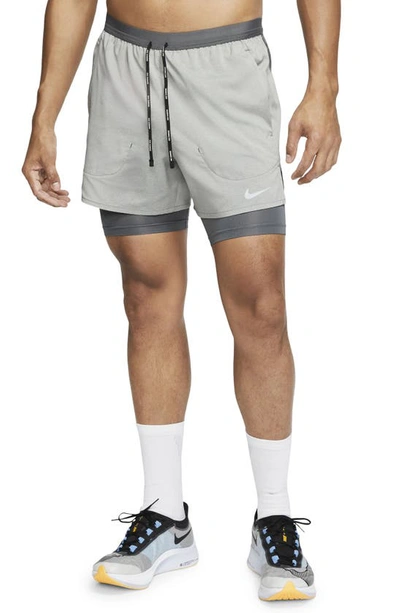 Shop Nike Dri-fit Flex Stride Pocket 2-in-1 Running Shorts In Iron Grey/ Iron Grey/ Heather