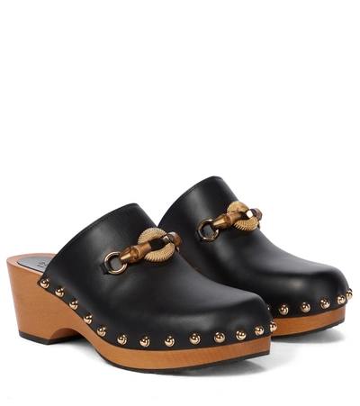 Shop Gucci Embellished Leather Mules In Black