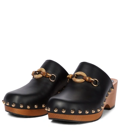 Shop Gucci Embellished Leather Mules In Black