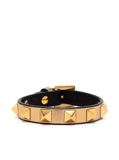 Shop Valentino Rockstud-embellished Bracelet In Gold