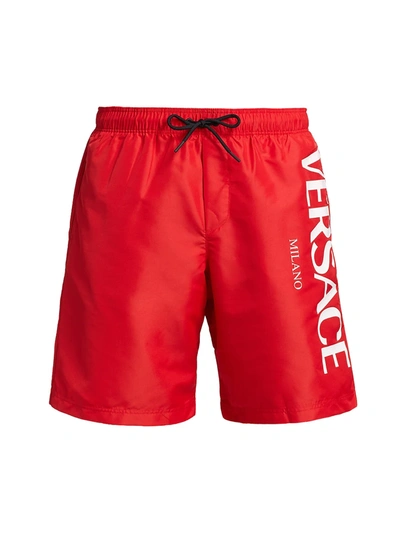 Shop Versace Logo Swim Trunks In Red