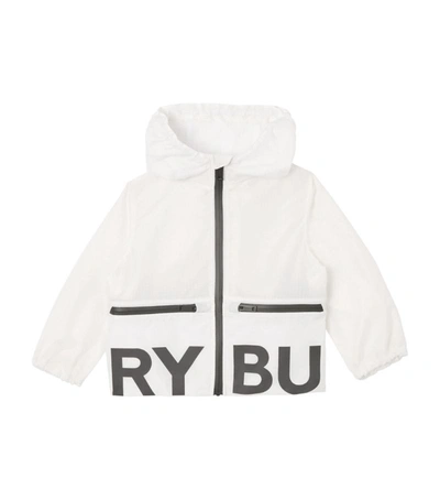 Shop Burberry Kids Hooded Logo Windbreaker Jacket (6-24 Months) In White